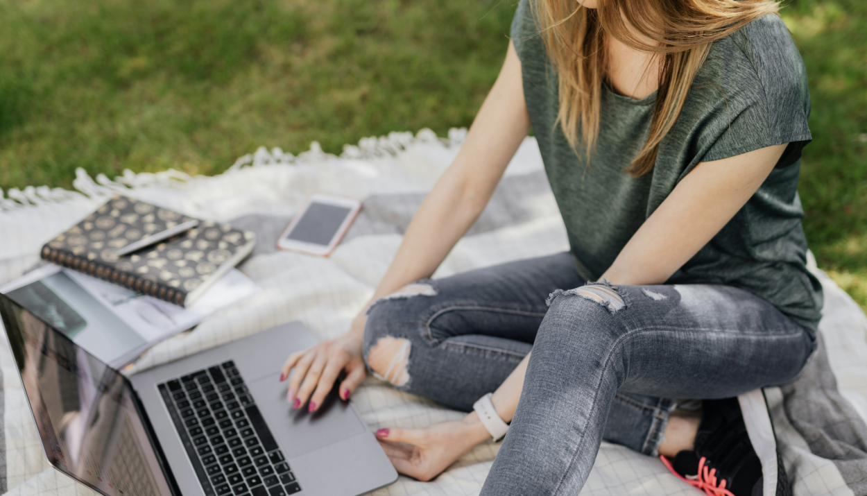 Woman with wifi on a campground